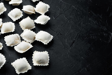 Frozen ravioli, on black background , with copyspace  and space for text
