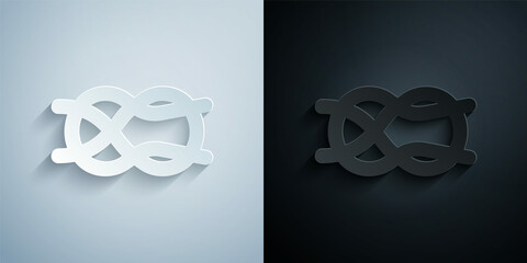 Paper cut Nautical rope knots icon isolated on grey and black background. Rope tied in a knot. Paper art style. Vector