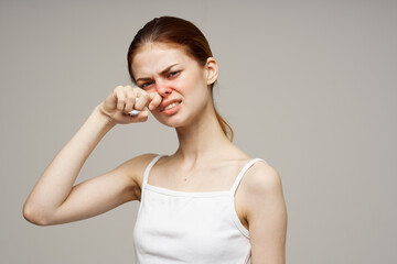 woman in white t-shirt with a scarf close-up