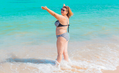 Plus size American woman at beach, enjoy the life. Life of people xxl size, happy nice natural beauty woman