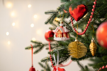 Christmas bauble on Christmas tree with lights bokeh background