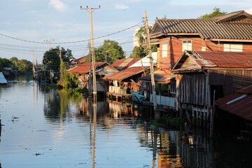 Wooden houses, community lifestyle along the canal in the suburbs of Bangkok the remaining