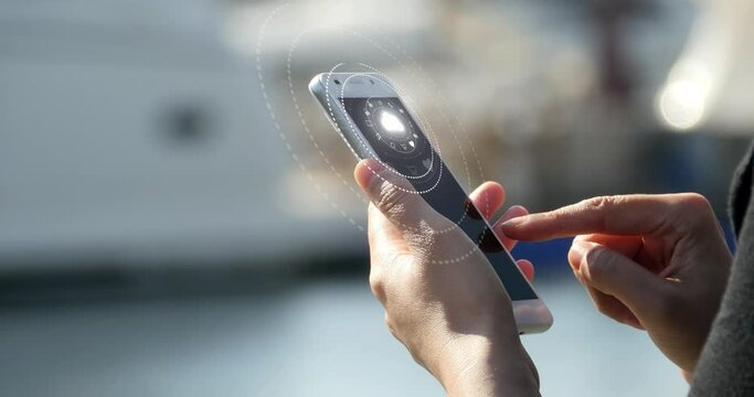 4k A girl using a smartphone at seaside;Update the information to cloud;virtual internet concept;on-line services icons.Cyber or technology background.communication network concept. 