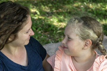 Happy mother, daughter. Cheerful  woman with the children.