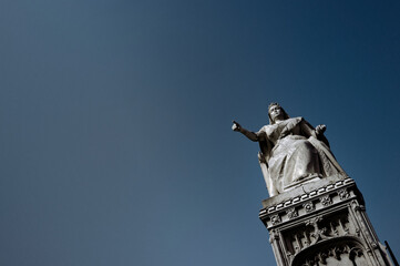 Queen Victoria Statue erected in 1898 to commemorate the Queen's jubilee. The figure of the Queen is enthroned and points towards the sea, Clifftown Parade, Southend-on-Sea, Essex, England