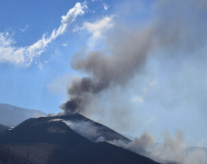 Volcano in full eruption with intense blue sky in the background, La Palma, Canary Islands, Spain