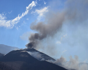 Volcano in full eruption with intense blue sky in the background, La Palma, Canary Islands, Spain