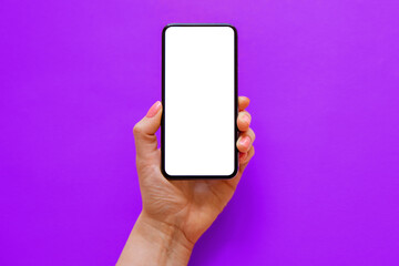 Mobile phone with empty screen on purple background