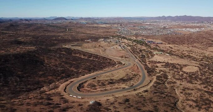 4K aerial drone video of Tony Rust racing track near Otjomuise township in Windhoek on hot sunny day, central Namibia, southern Africa