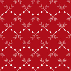Fototapeta premium Geometric seamless pattern with repetitive crossed arrows on red backdrop for Christmas theme designs.vector illustration 