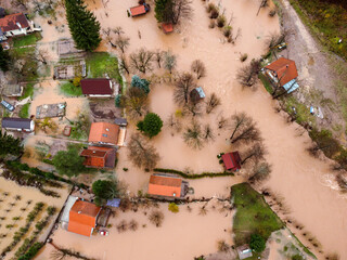 Aerial drone view of flooded villages, fields, farms and houses. Aftermath of devastating river...