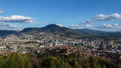 Fototapeta na wymiar Aerial drone view of city of Sarajevo. Capital of Bosnia and Herzegovina. Mountains near Sarajevo in early spring.