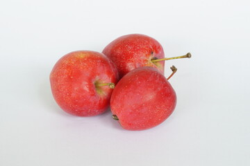 red candy apples on white background