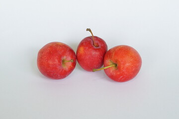 red candy apples on white background