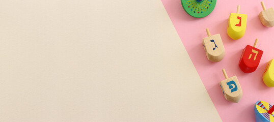 Image of jewish holiday Hanukkah with wooden dreidels collection (spinning top)