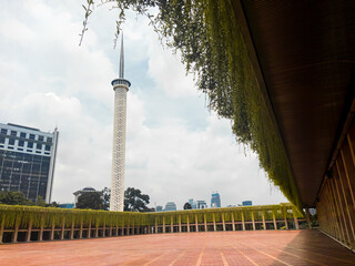 Central Jakarta, Indonesia-April 5th, 2021:The height of the Istiqlal mosque minaret, symbolizing the number of verses (6,666 verses) and the number of juz (30 juz) in the Koran.
