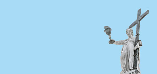 Banner with Saint Maria with big cross and holy grail at the roof of Church of San Giorgio Maggiore in Venice, Italy, at blue sky solid background with copy space. Concept religion travel sites.