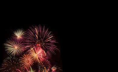 colorful new year holiday fireworks with copy space