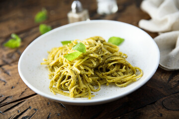 Traditional spaghetti with pesto sauce
