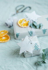 Christmas  decorative homemade gift box wrapped in brown kraft paper