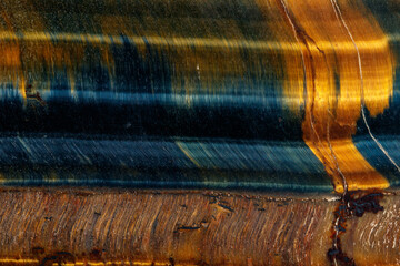 Quartz eye macro stone tiger eye on a black background