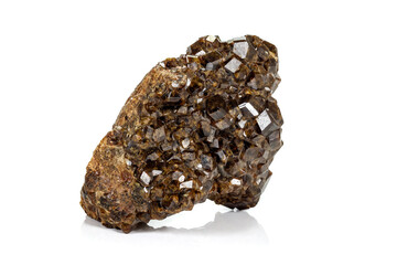 Macro stone Grossular mineral in rock on a white background