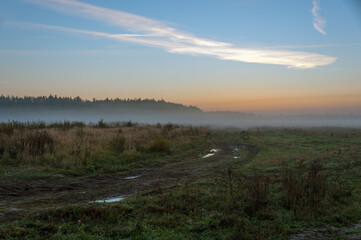 Obraz premium September morning landscape with fog