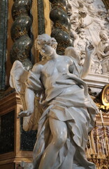 Obraz premium Marble Angel Statue at the Sant'Ignazio di Loyola in Campo Marzio Church in Rome, Italy