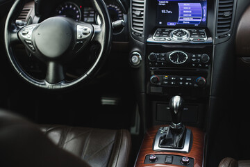 Photo of the interior of the car. Steering wheel, dashboard.