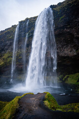 Beautiful, with cave inside Seljalandsfoss waterfall in South Iceland
