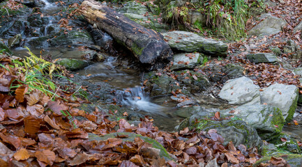 Time exposure of the little river called Helle in the german city Winterberg