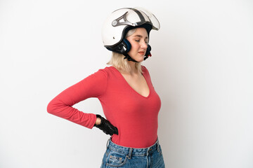 Young caucasian woman with a motorcycle helmet isolated on white background suffering from backache for having made an effort