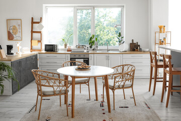 Fototapeta na wymiar Studio apartment with contemporary kitchen