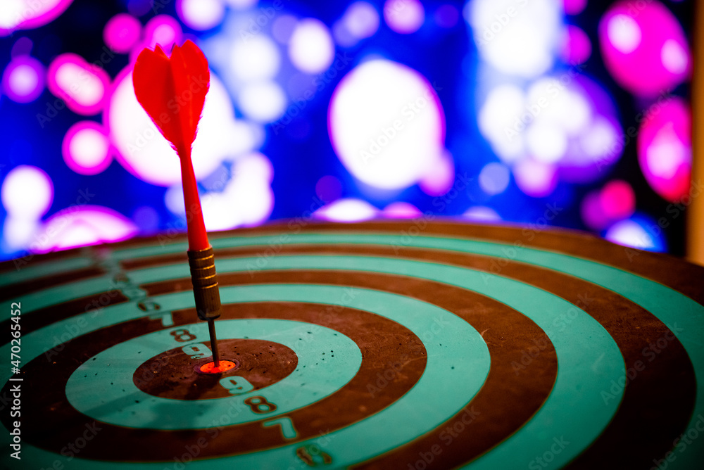 Poster bullseye is a target of business. dart is an opportunity and dartboard is the target and goal. so bo