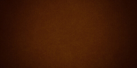 Dark red abstract grunge background color, light canter spotlight, faint orange vintage background
