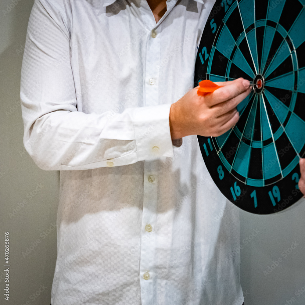 Poster bullseye is a target of business. dart is an opportunity and dartboard is the target and goal. so bo