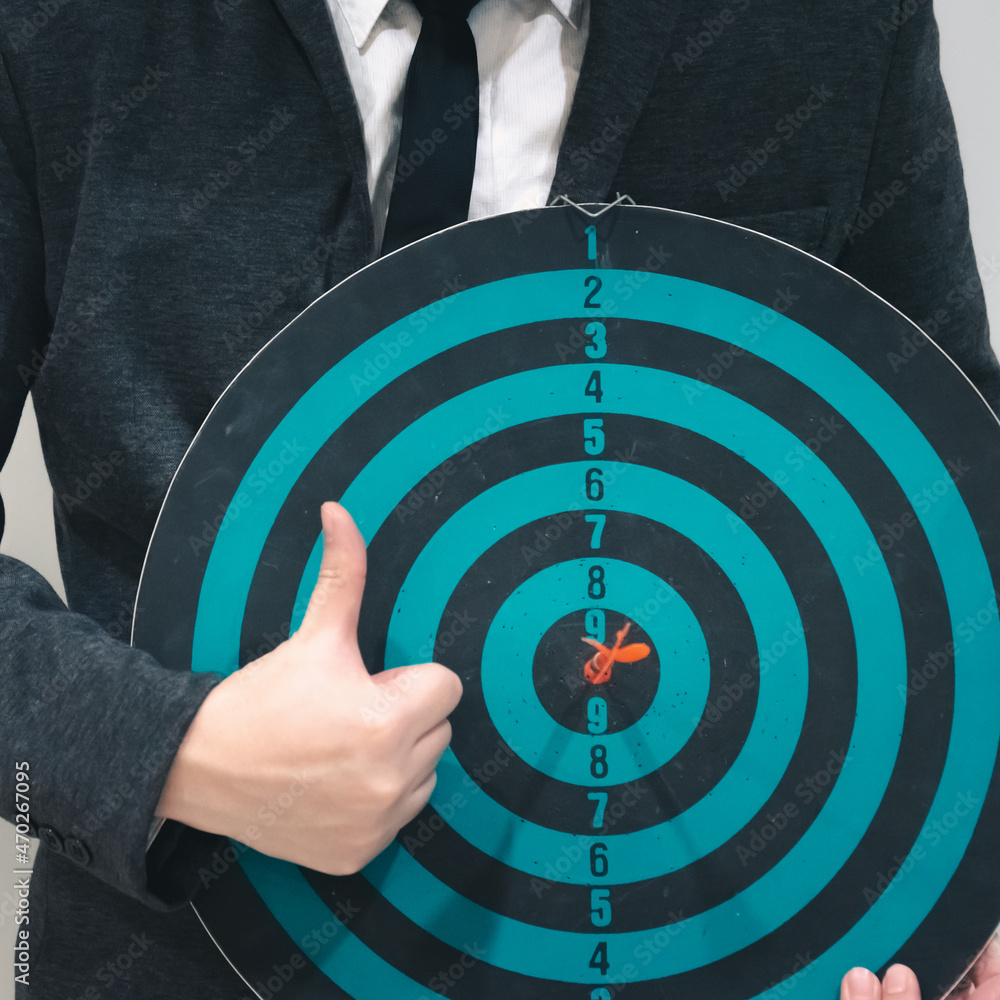 Poster bullseye is a target of business. dart is an opportunity and dartboard is the target and goal. so bo