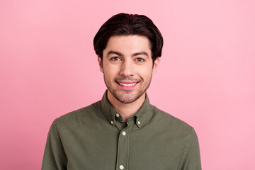 Photo of cheerful positive man sincere toothy beaming smile wear khaki shirt isolated pink color background