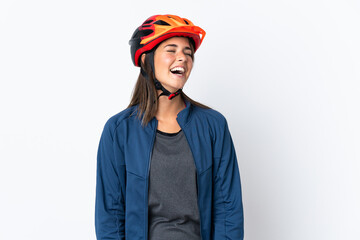 Young cyclist brazilian girl isolated on white  background laughing - obrazy, fototapety, plakaty