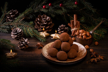 chocolate truffles, with spices and Christmas decorations. Christmas composition