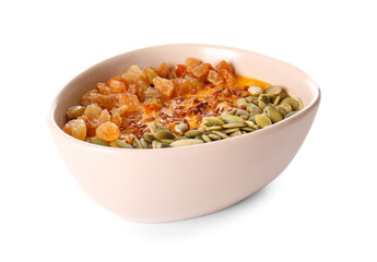 Bowl of tasty oatmeal with pumpkin on white background