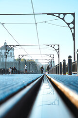 Top view of the Don Luis I bridge in Porto, Portugal. Detail of the tramway tracks.