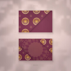 Burgundy abstract gold pattern business card for your brand.