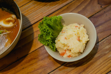 Top view of Japanese style Potato salad at Sapporo ramen restaurant in Bangkok Thailand