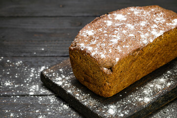 Loaf of rye bread on a cutting board