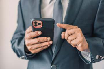 businessman holding smartphone 