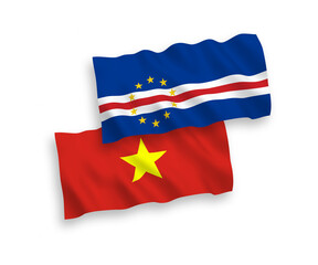 National vector fabric wave flags of Republic of Cabo Verde and Vietnam isolated on white background. 1 to 2 proportion.