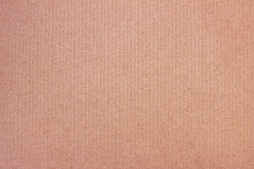 A sheet of brown cardboard. Paper natural texture.