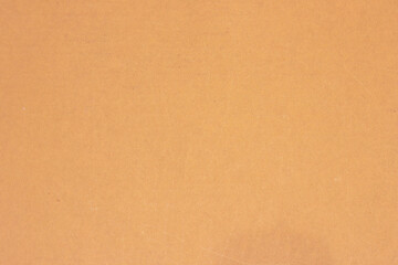 A sheet of brown cardboard. Paper natural texture.