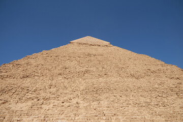Side and faced top of  Pyramid of Khafre (also read as Khafra, Khefren) or of Chephren is the second-tallest and second-largest of the Ancient Egyptian Pyramids of Giza
